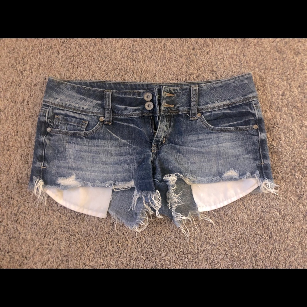 Dark wash denim shorts with double buttons